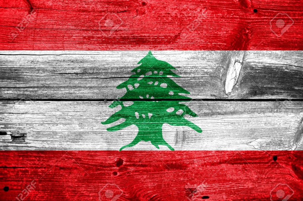 Lebanon Flag painted on old wood plank texture